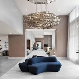 Lobby and coworking lounge at Courtyard Delray Beach.
