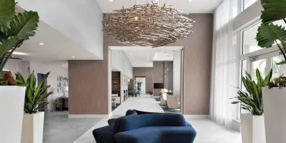 Lobby and coworking lounge at Courtyard Delray Beach.
