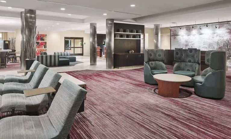 Lobby and coworking lounge at Courtyard Bossier City.