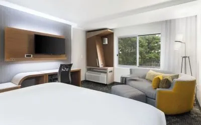Day use room with sofa and work desk at Courtyard By Marriott Ruston.