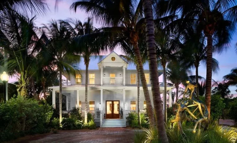 Hotel exterior at dusk at Parrot Key Hotel & Villas.