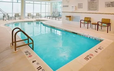 Refreshing indoor pool at Springhill Suites Carle Place.