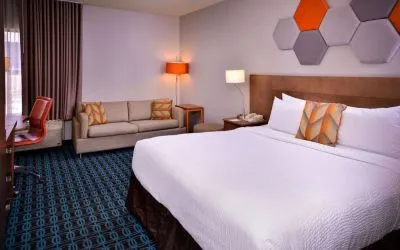 Day use room with sofa and work desk at Fairfield Inn By Marriott Las Vegas Convention Center.