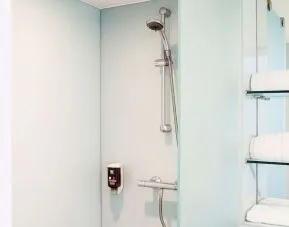 Guest bathroom with shower at Ibis Styles Crewe.