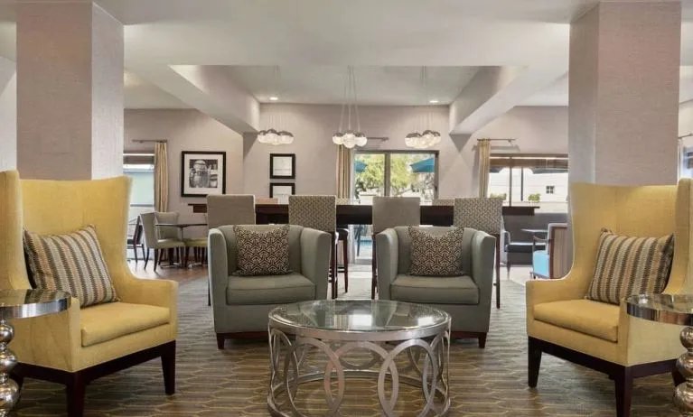 Lobby and coworking lounge at Hampton Inn Phoenix-Midtown-Downtown Area.