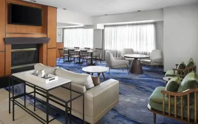 Lobby and coworking lounge at Fairfield Inn By Marriott Denver Airport.