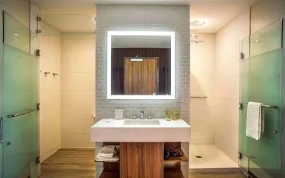 Guest bathroom with shower and free toiletries at Wyndham Garden North Bergen Near Secaucus.