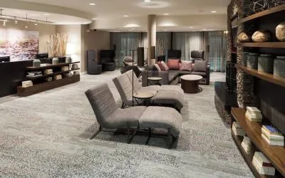Lobby and coworking lounge at Courtyard By Marriott Hattiesburg.