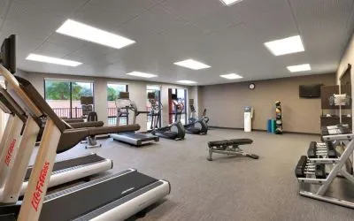 Fitness center available at Courtyard By Marriott Houston NASA/Clear Lake.