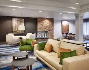 Lobby and coworking lounge at Fairfield Inn & Suites By Marriott Albany.