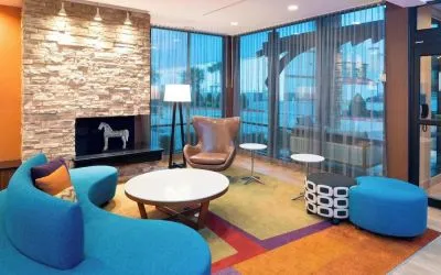 Lobby and coworking lounge at Fairfield Inn & Suites By Marriott Houston Pasadena.