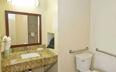 Guest bathroom with shower at The Stevenson Monterey.