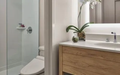 Guest bathroom with shower at Alohilani Resort Waikiki Beach.