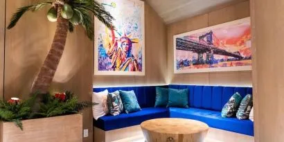 Coworking lobby seating at Margaritaville Resort Times Square.