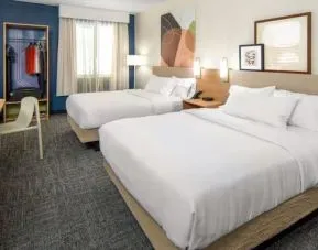 Day room with queen beds at Spark By Hilton Kannapolis.