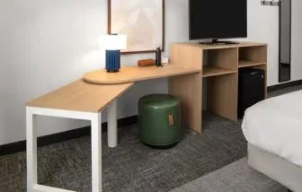 Day room with work space at Spark By Hilton Kannapolis.