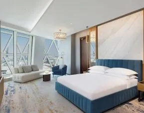 King room with TV at Velero Hotel Doha Lusail.