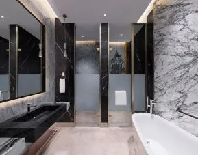 King room with bathroom at Velero Hotel Doha Lusail.