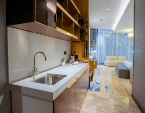 King room with kitchen at Velero Hotel Doha Lusail.