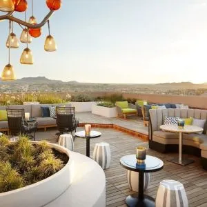 Outdoor furniture in rooftop perfect for coworking at The Plaza Pioneer Park, El Paso.