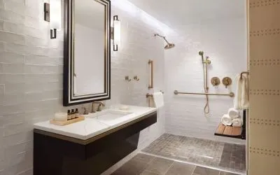 Guest bathroom with shower at The Plaza Pioneer Park, El Paso.
