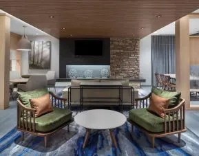 Lobby and coworking lounge at Fairfield Inn & Suites By Marriott Kenosha Pleasant Prairie.