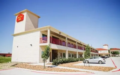 Hotel parking at Palace Inn 290 & Jones Rd.
