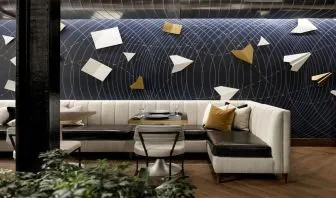 Lobby and coworking lounge at Rand Tower Hotel, Minneapolis, A Marriott Tribute Portfolio Hotel.