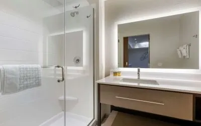 Guest bathroom with shower at Best Western Plus Executive Residency Phoenix North Happy Valley.