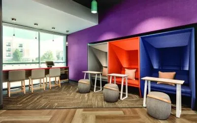 Comfortable working space with natural light at Tru By Hilton Wichita Northeast.
