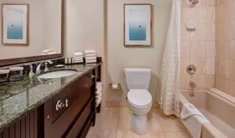 Private guest bathroom with free toiletries at Embassy Suites By Hilton San Diego-La Jolla.