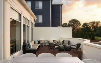 Outdoor terrace with lounge seating at Hilton Garden Inn Kennett Square.