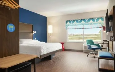 Spacious day use room with work desk at Tru By Hilton Milwaukee Brookfield.