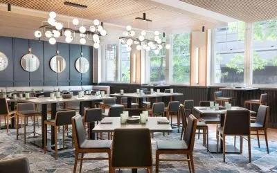 Dining area perfect for coworking at The Slate Denver, Tapestry Collection By Hilton.