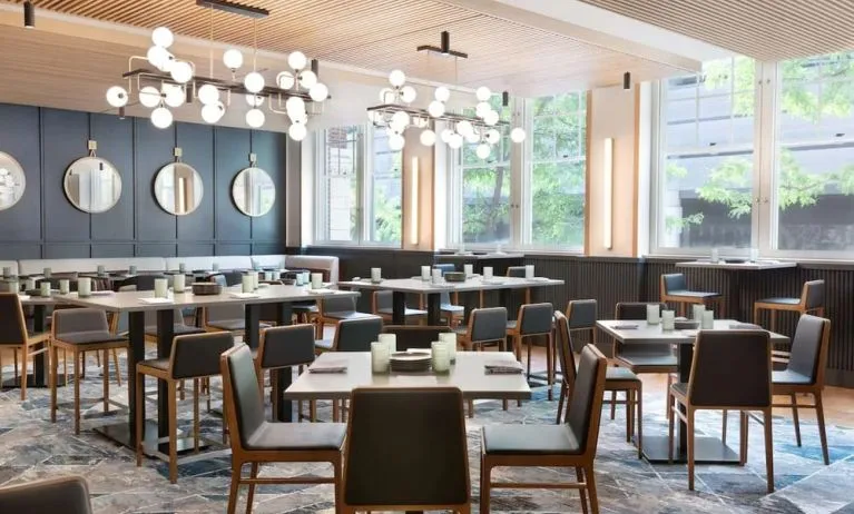 Dining area perfect for coworking at The Slate Denver, Tapestry Collection By Hilton.