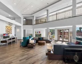 Lobby and coworking lounge at Hampton Inn & Suites Phoenix/Gilbert.