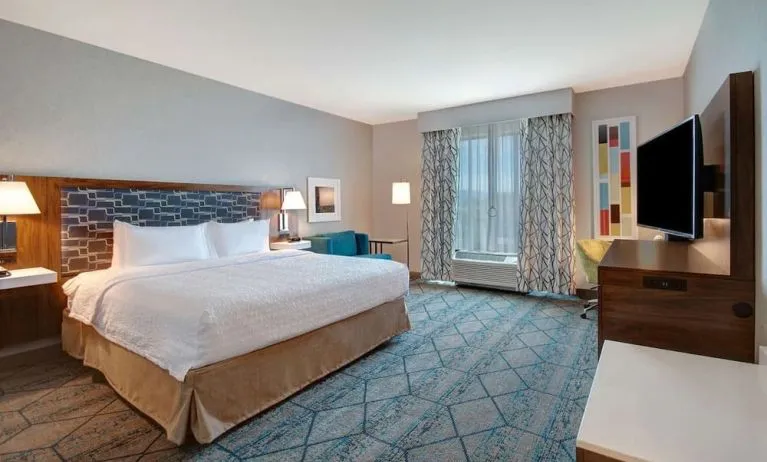 Spacious day use room with work desk at Hampton Inn & Suites Sunnyvale Silicon Valley.