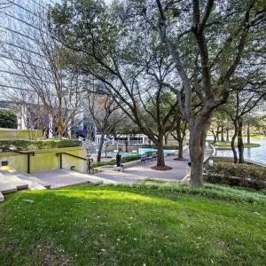 Courtyard beside private lake at Hilton Dallas Lincoln Centre.