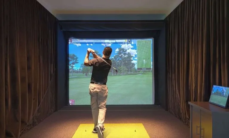 Golf simulators available at Embassy Suites By Hilton Myrtle Beach Oceanfront Resort.