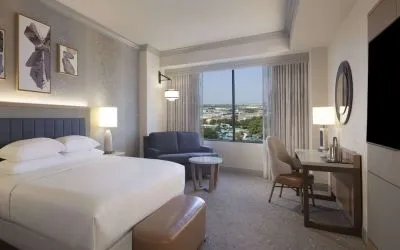 Day use room with work desk and sofa at Hilton Anatole.