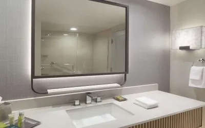 Guest bathroom with shower at Hilton Anatole.