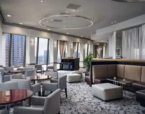 Dining area with natural light perfect for coworking at Hilton Atlanta.