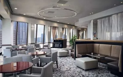 Dining area with natural light perfect for coworking at Hilton Atlanta.