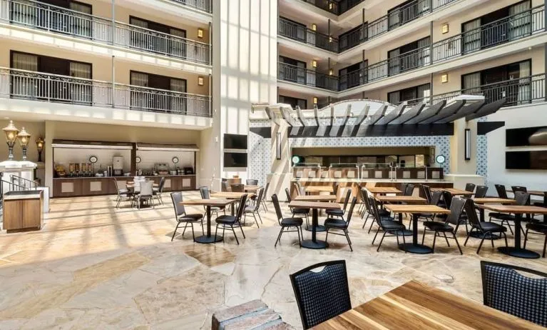 Dining area perfect for coworking at Embassy Suites By Hilton Los Angeles International Airport South.
