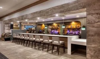 Hotel bar at DoubleTree By Hilton Tulsa - Warren Place.