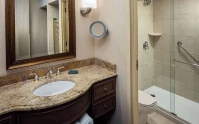 Guest bathroom with shower at Hilton Chicago-Northbrook.