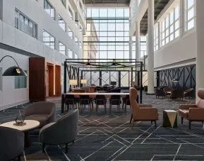 Lobby and coworking space at Delta Hotels By Marriott Little Rock West.