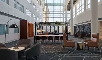 Lobby and coworking space at Delta Hotels By Marriott Little Rock West.