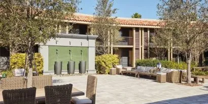 Garden with outdoor furniture at DoubleTree By Hilton Orlando At SeaWorld.