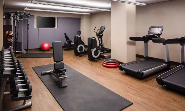 Fully equipped fitness center at Hilton Brooklyn New York.